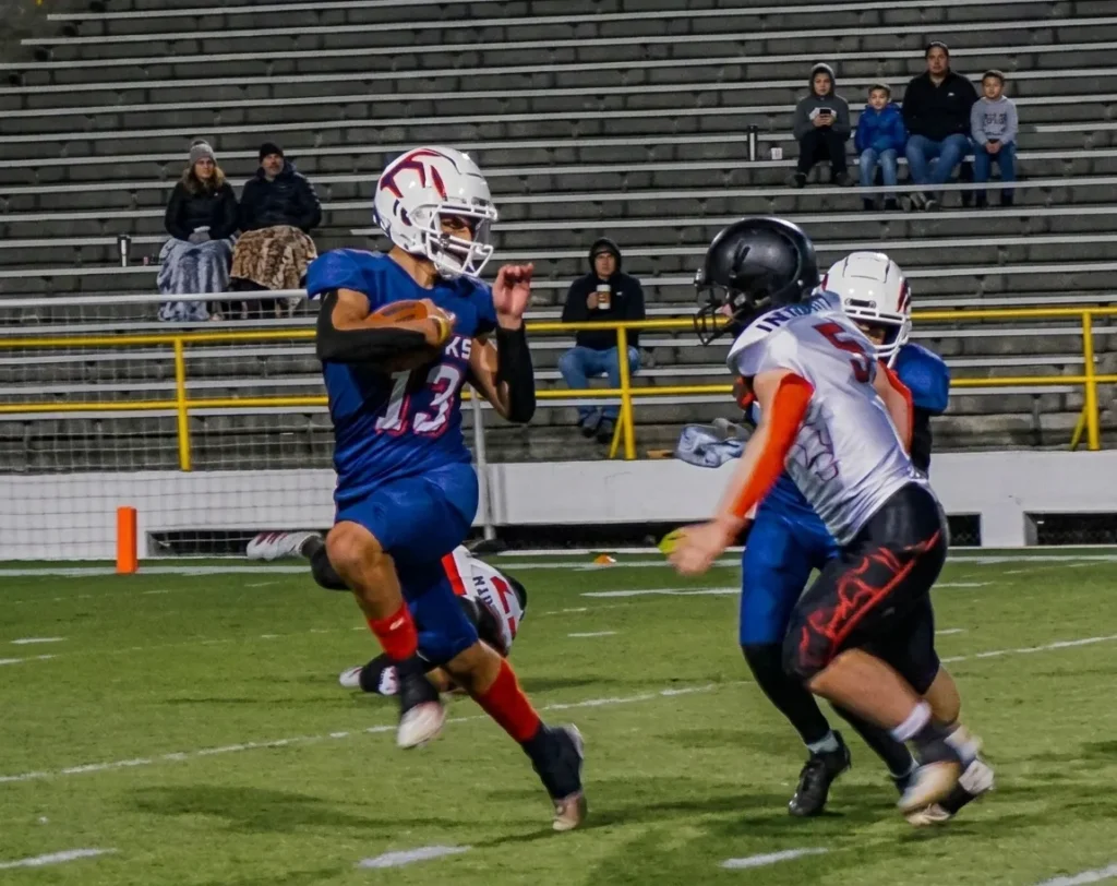 Quarterback run stiff arm