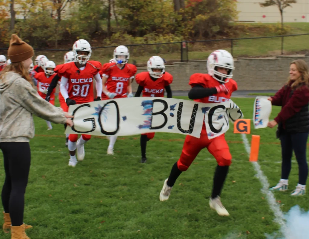 North Oakland Bucks players run out before game